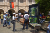 A group of people promote the natural beauty of the Portobelo area in the plaza in front of the Customs House - Portobello, Colón, Panama - photo by H.Olarte